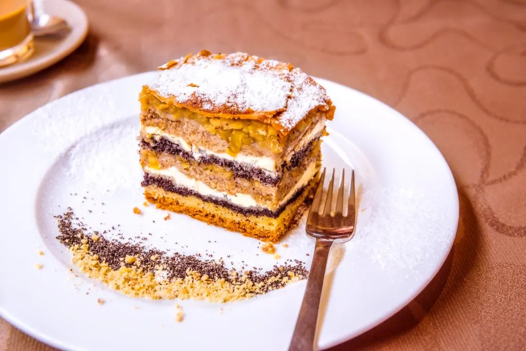 Traditional Slovenian cake with layers - Exquisite sweet dessert, a traditional cake from Prekmurje with poppy seeds, nuts, cottage cheese and apple layers, called Prekmurska gibanica.
